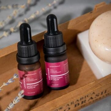 Close-up of Lanthome Rosehip Oil dropper above the bottle, available at rosvia.com.